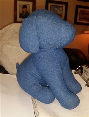 A dog made out of blue denim material